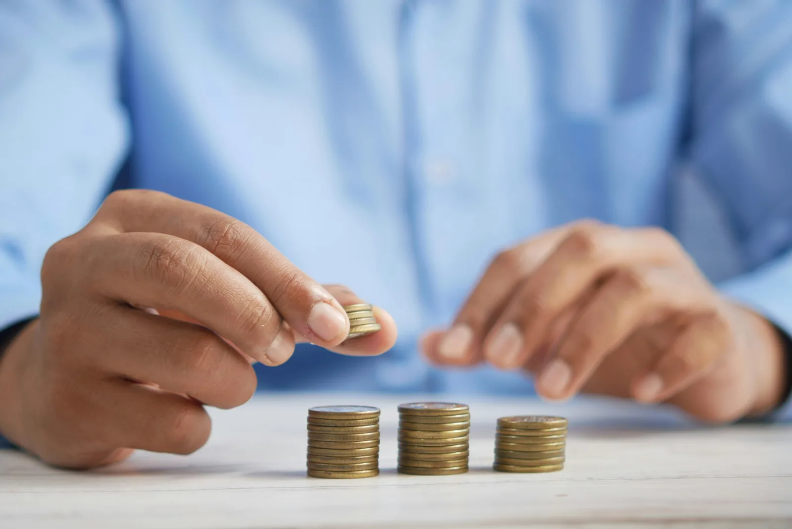 Two people reviewing a printed financial plan together at a desk